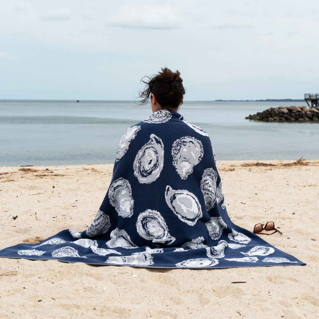 Rightside Design's Oyster Pattern Indoor Outdoor Knit Throw featured in the Garden & Outdoor Living Lookbook article in Gift Shop Plus